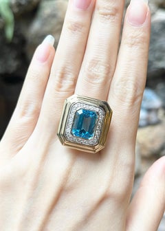 Blue Topaz with Diamond 0.64 Ring set in 14K Gold Settings