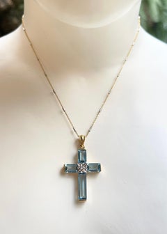 Blue Topaz with Diamond Cross Pendant set in 14K Gold Settings