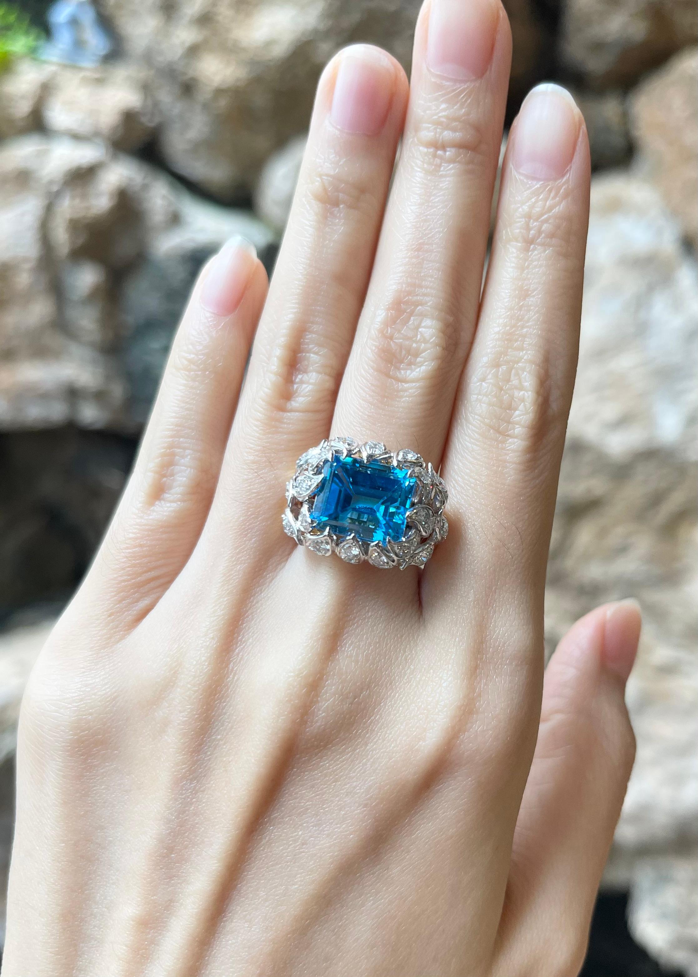 Blue Topaz 7.72 carats with Diamond 1.68 carats Ring set in 14K Gold Settings

Width:  2.2 cm 
Length: 1.6 cm
Ring Size: 56
Total Weight: 10.29 grams

