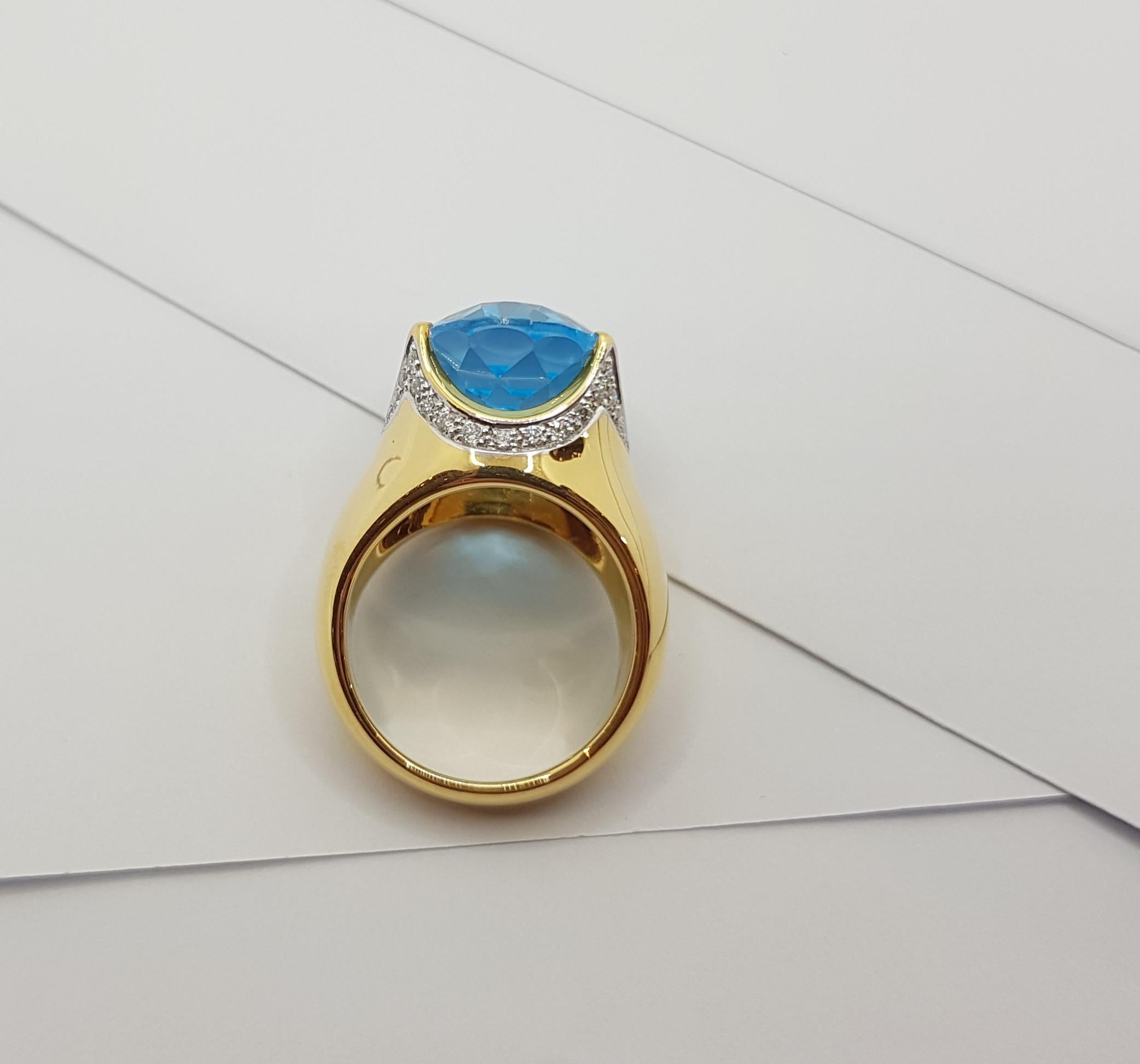 Bague en or 18 carats sertie d'une topaze bleue et de diamants en vente 6