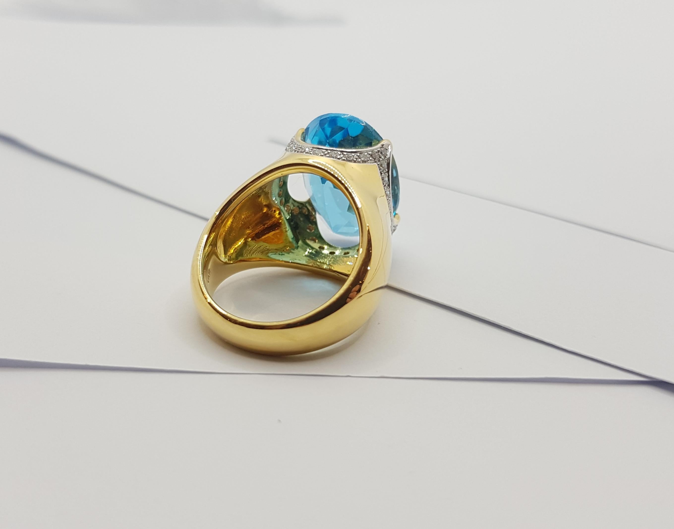 Bague en or 18 carats sertie d'une topaze bleue et de diamants en vente 8