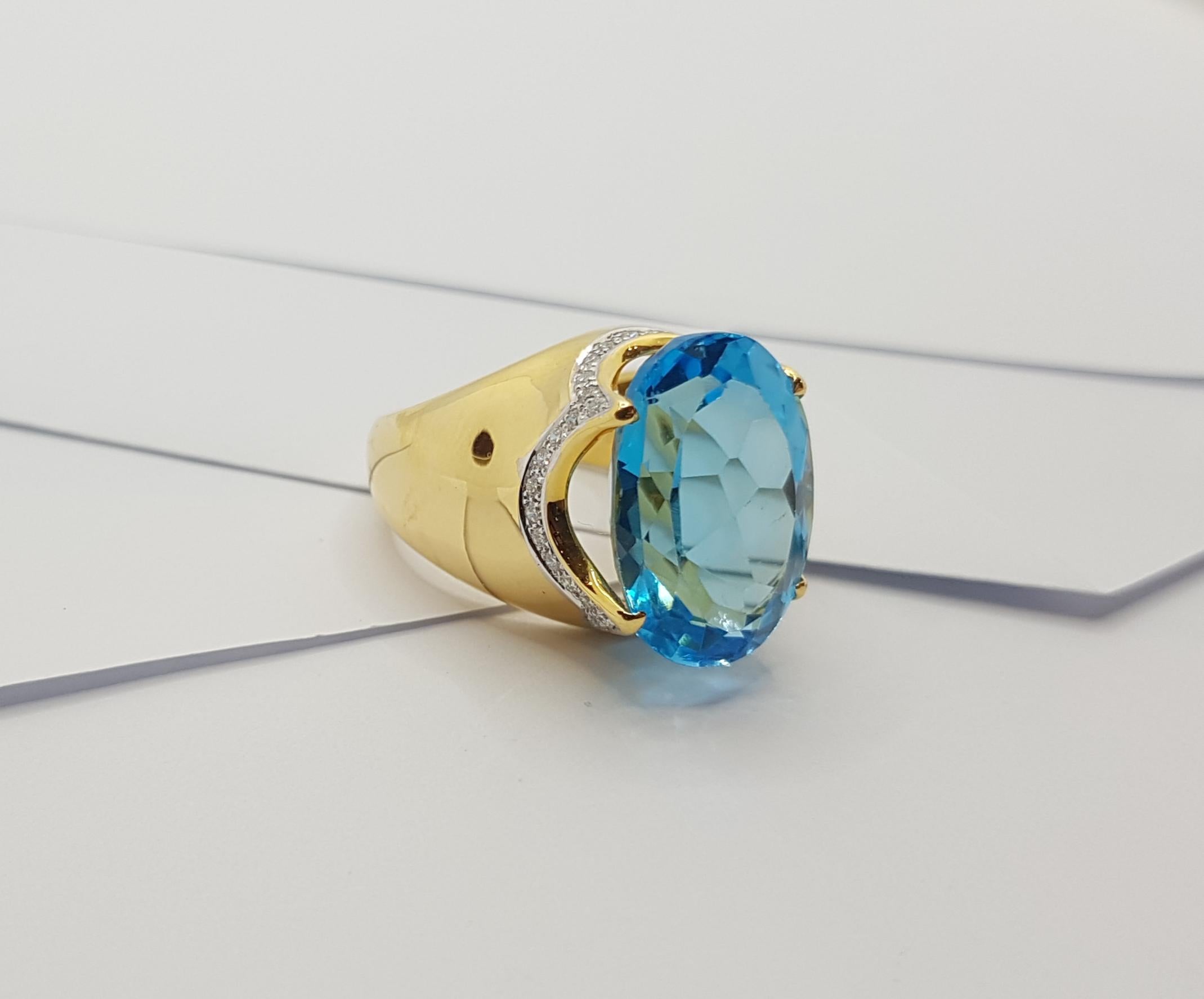 Bague en or 18 carats sertie d'une topaze bleue et de diamants en vente 9