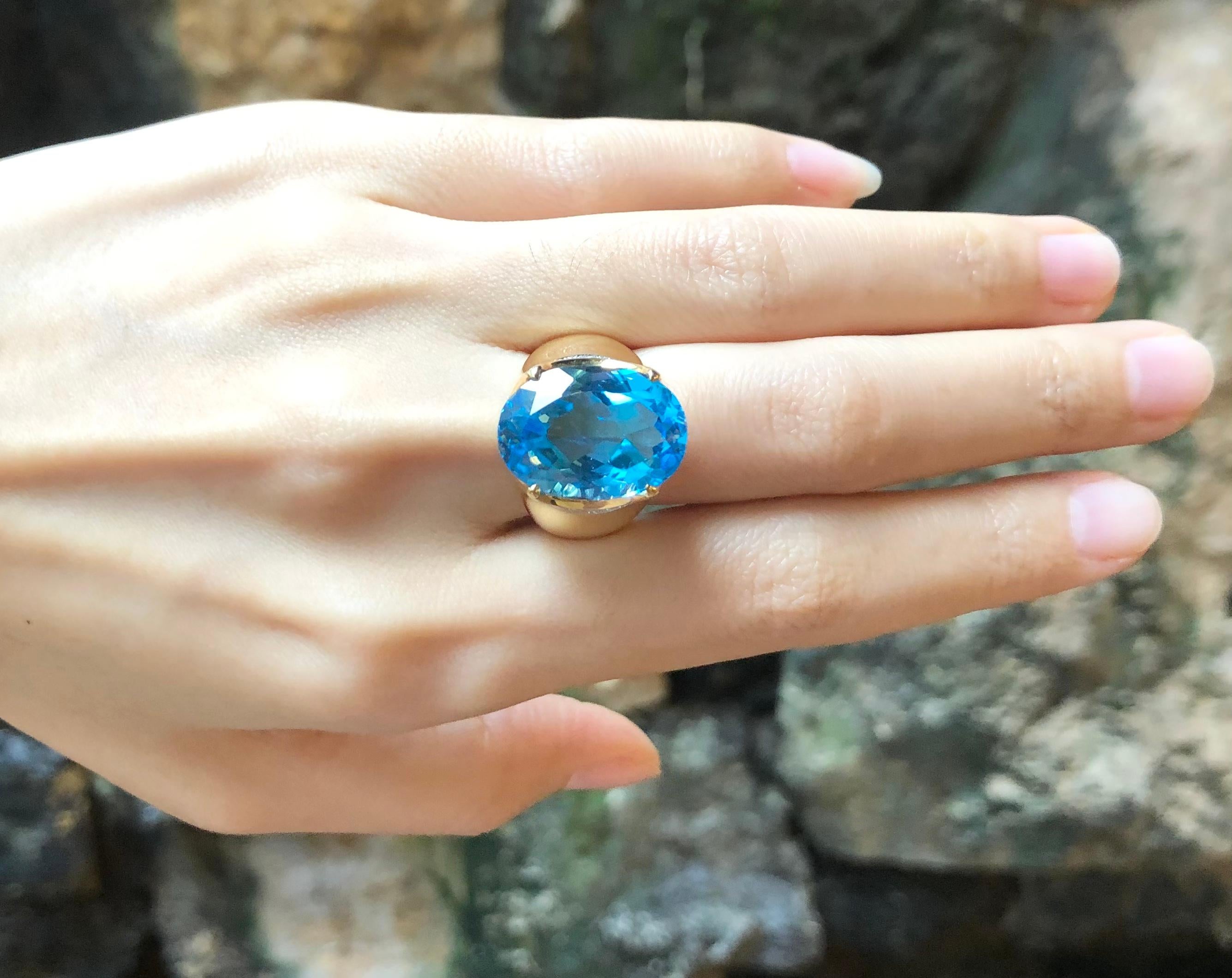 Topaze bleue 15,94 carats et diamant 0,39 carat Bague sertie d'or 18 carats

Largeur :  1.2 cm 
Longueur : 1,8 cm
Taille de l'anneau : 53
Poids total : 15,84 grammes


