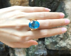Blue Topaz with Diamond Ring Set in 18 Karat Gold Settings