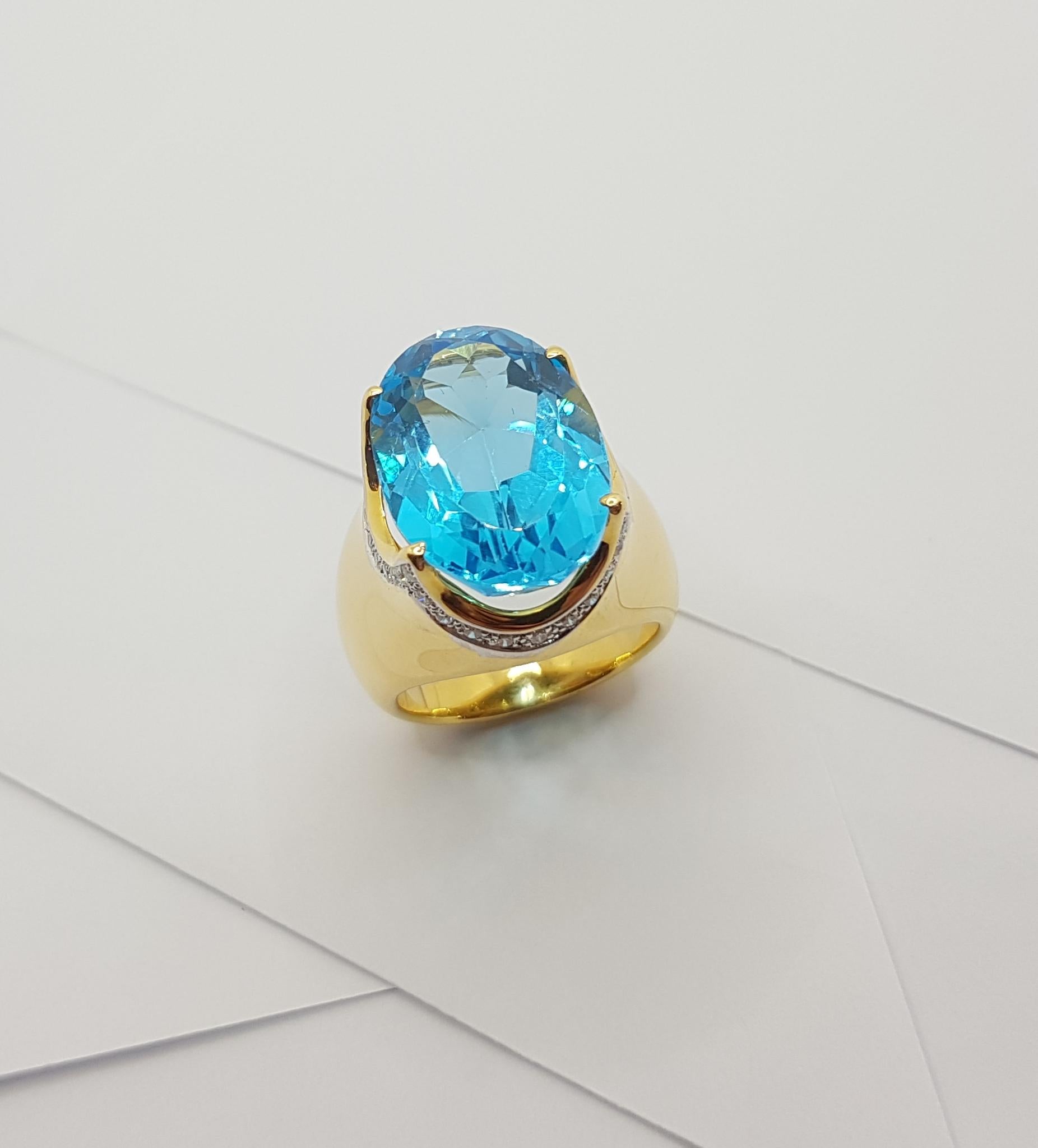 Bague en or 18 carats sertie d'une topaze bleue et de diamants en vente 14