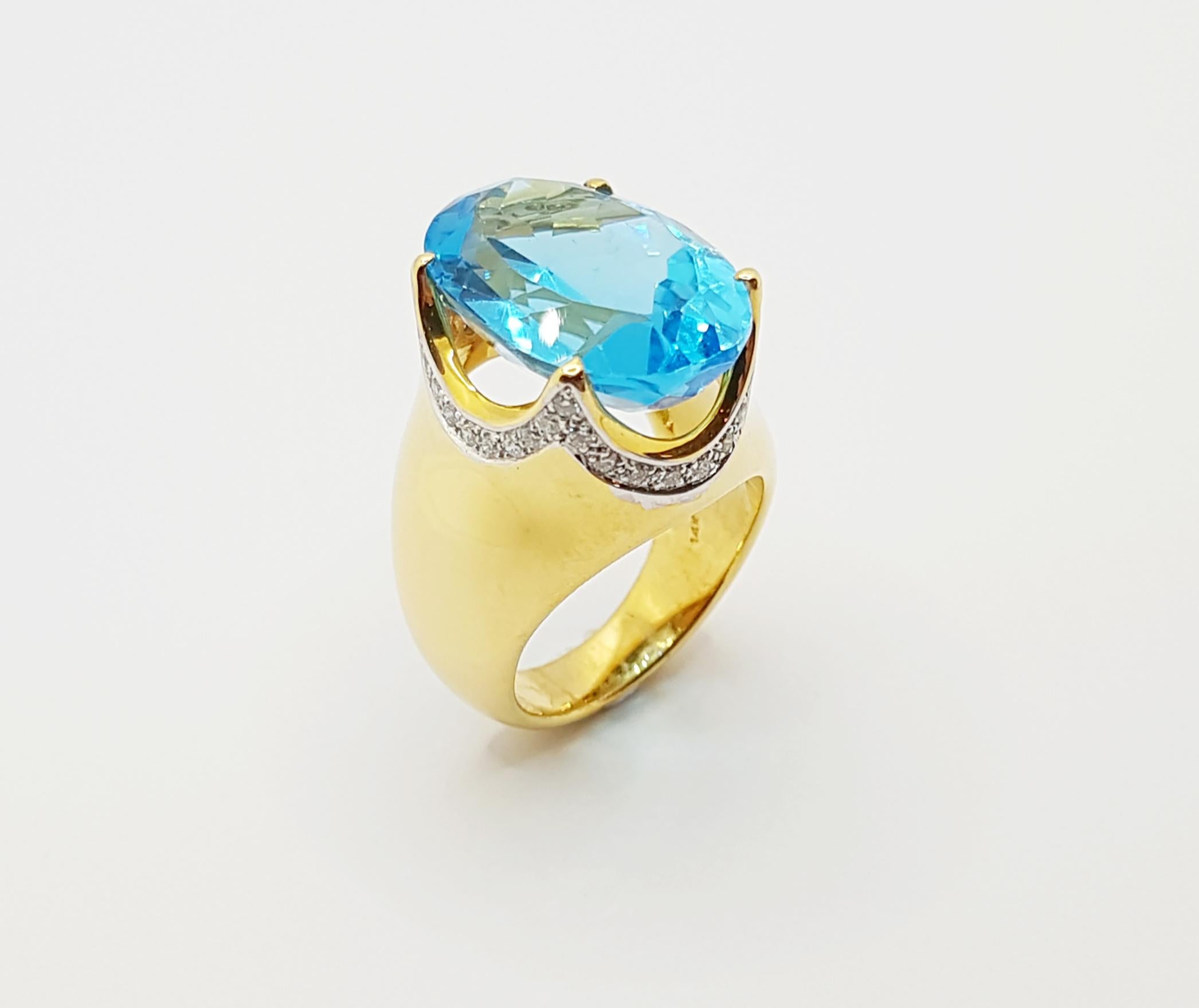 Bague en or 18 carats sertie d'une topaze bleue et de diamants en vente 3