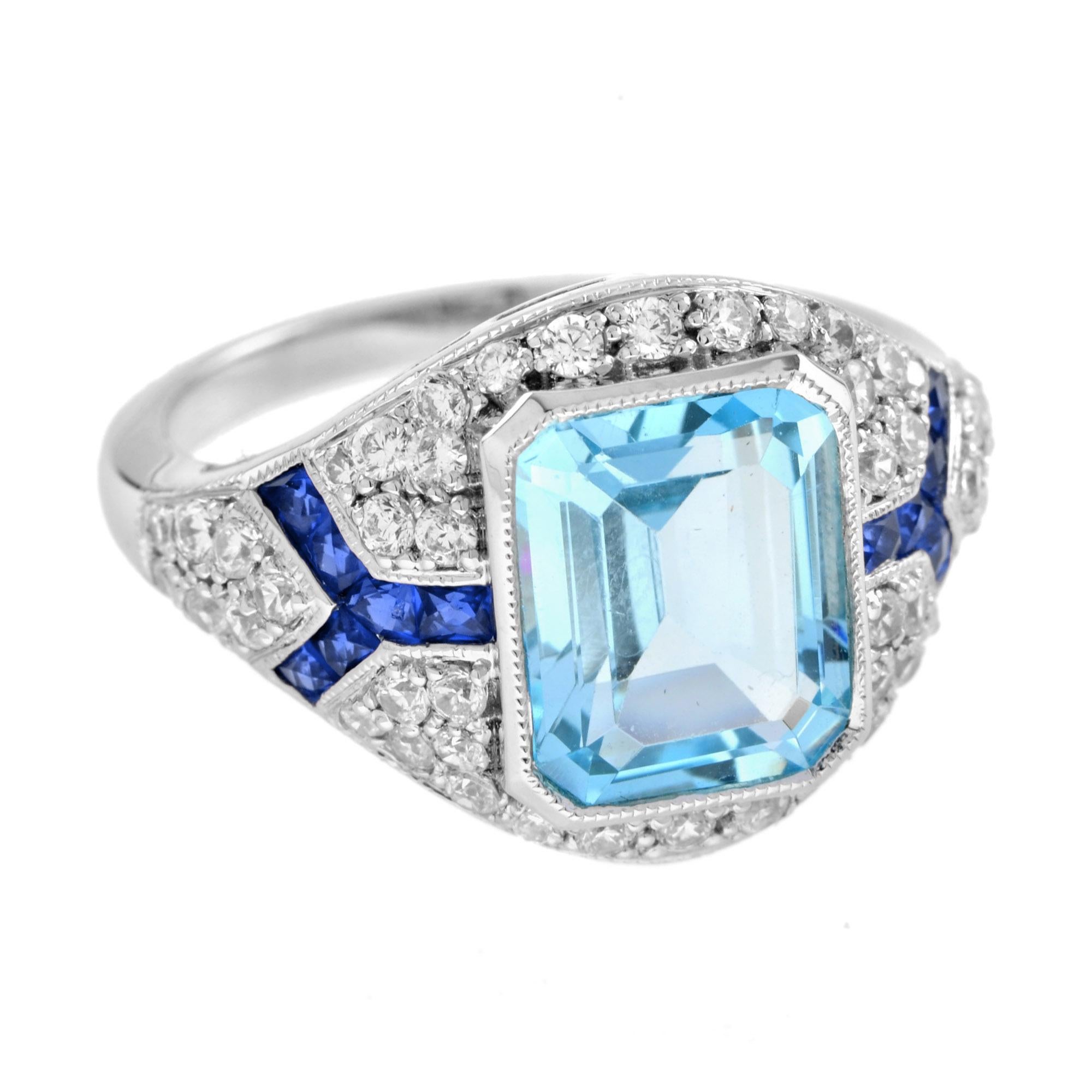 The centerpiece of the ring is a 4.5 carats emerald cut blue topaz highlight by .60 carat round brilliant diamonds. The sides of the polished 18k white gold ring are edged with blue sapphire for an extra touch of elegance.   

Ring