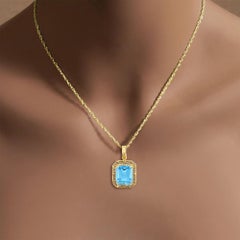 Blue Topaz with Gold Greek Key Bezel Necklace