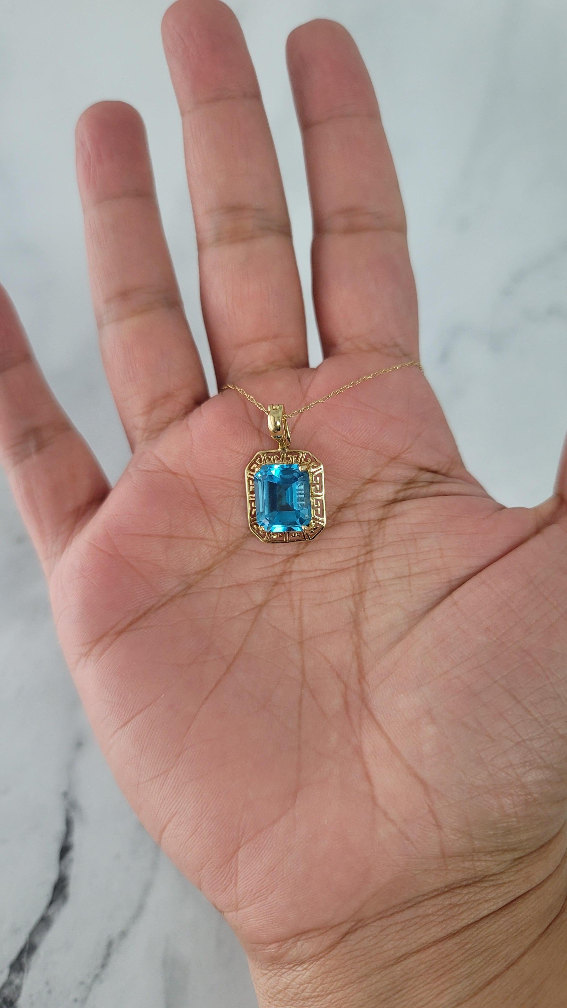 Emerald Cut Blue Topaz with Gold Greek Key Bezel Necklace For Sale