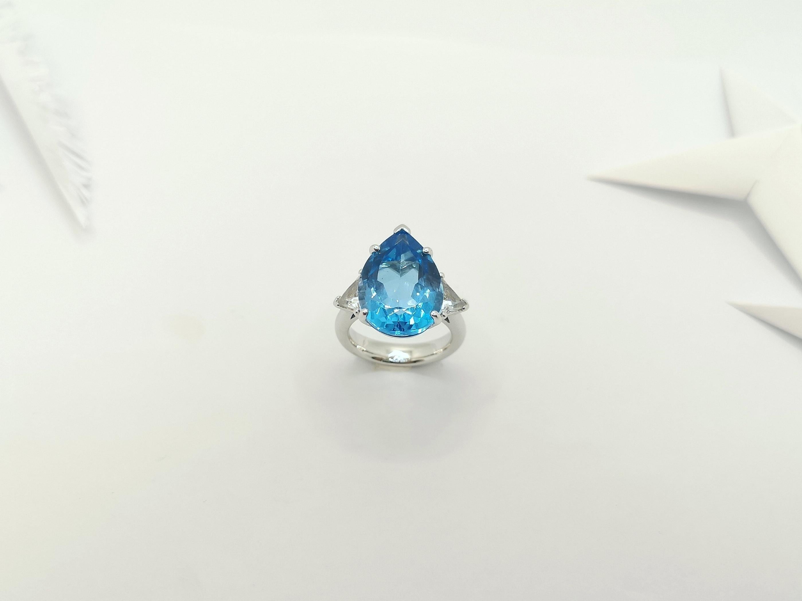 Blue Topaz 15.25 carats with White Topaz 1.51 carats Ring set in 18 Karat White Gold Settings

Width:  2.1 cm 
Length: 1.7 cm
Ring Size: 54
Total Weight: 13.4 grams

