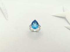 Blue Topaz with White Topaz Ring Set in 18 Karat White Gold Settings
