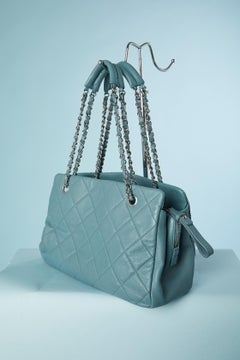 Blue topstitched leather bag with chains handles Chanel Numbered