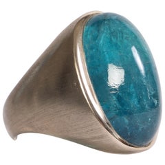 18 K White Brushed Gold Ring With A Blue Tourmaline Cabochon by Marion Jeantet