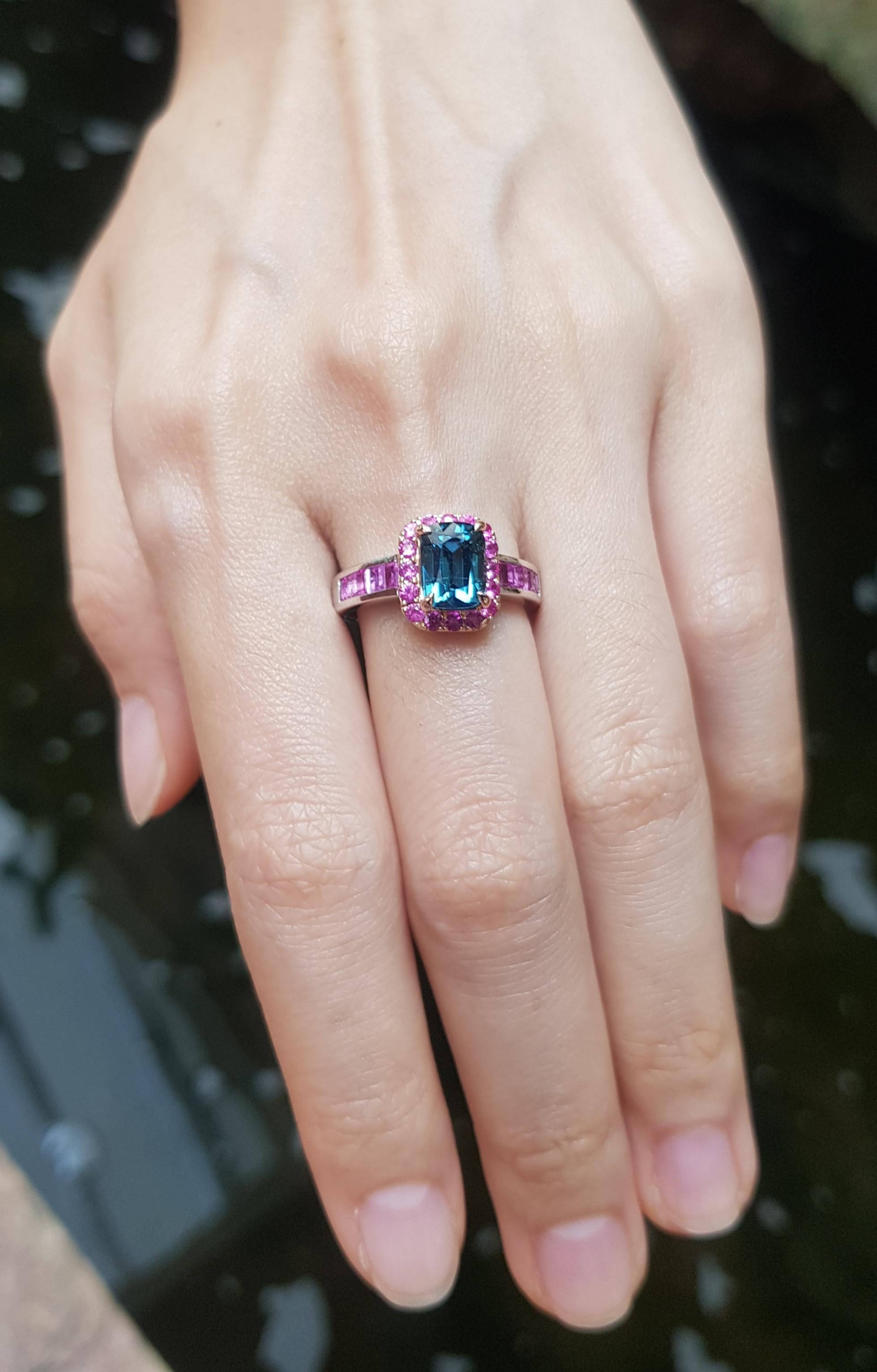 Blue Tourmaline 1.90 carats with Pink Sapphire 1.12 carats Ring set in 18K White Gold Settings

Width:  1.0 cm 
Length: 1.1 cm
Ring Size: 55
Total Weight: 6.87 grams

