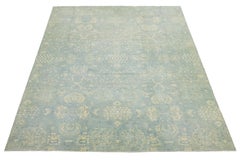 Blauer, handgefertigter Woll- und Seidenteppich mit Blumendesign