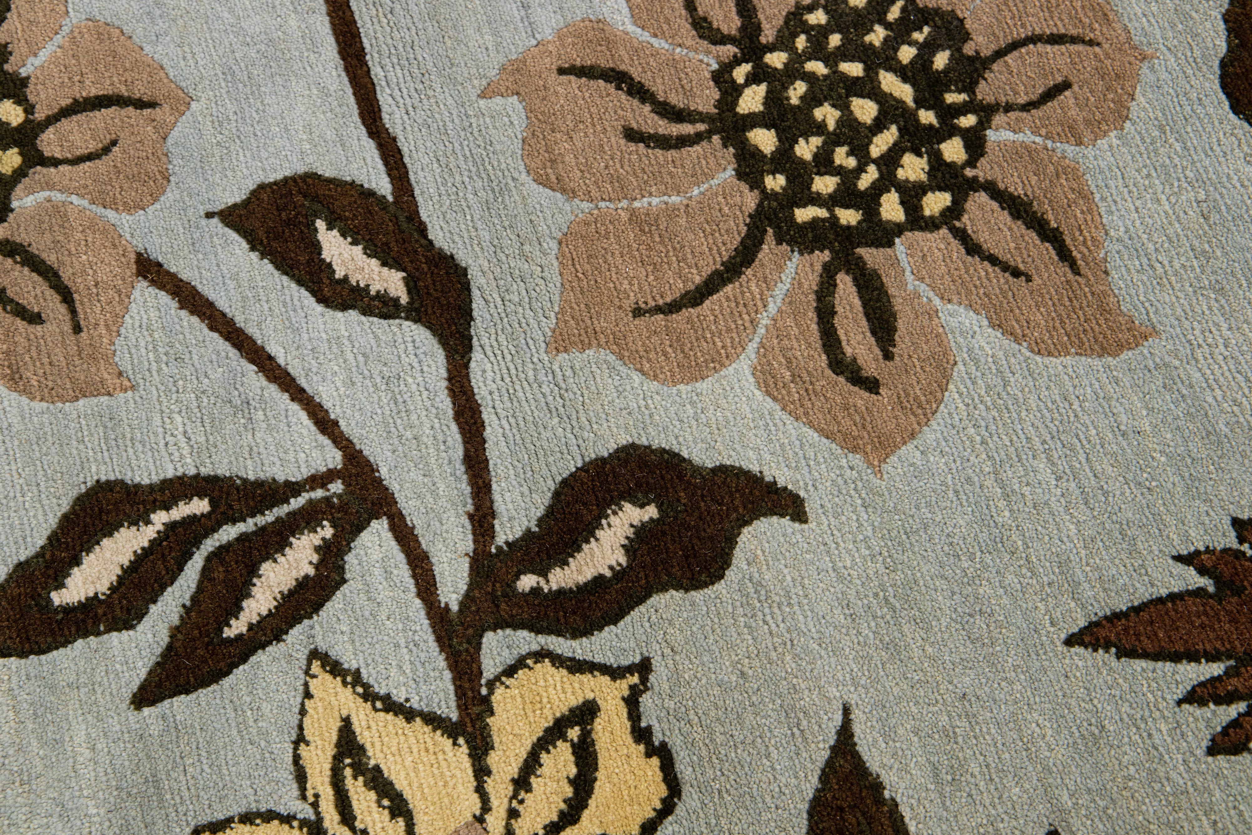 Nepalese Blue Transitional Wool Rug With Allover Floral Design For Sale