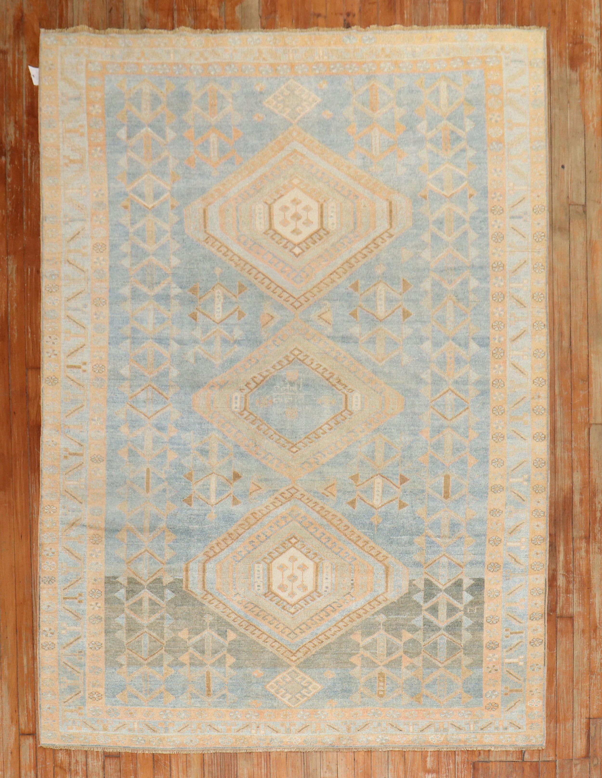 An early 20th century Persian Malayer tribal small room size rug in predominantly light blue

Measures: 5'9