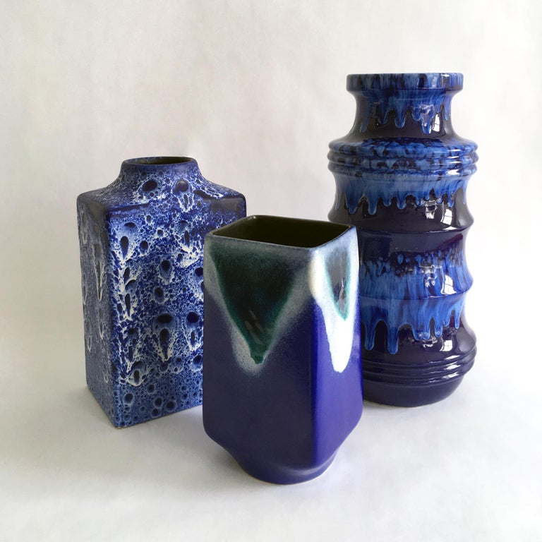 A trio of blue vases by Scheurich, ES Keramik and Strehla. The variation in glazes and shapes makes for a stunning set.

Measurements:
Scheurich: H 11. 5
