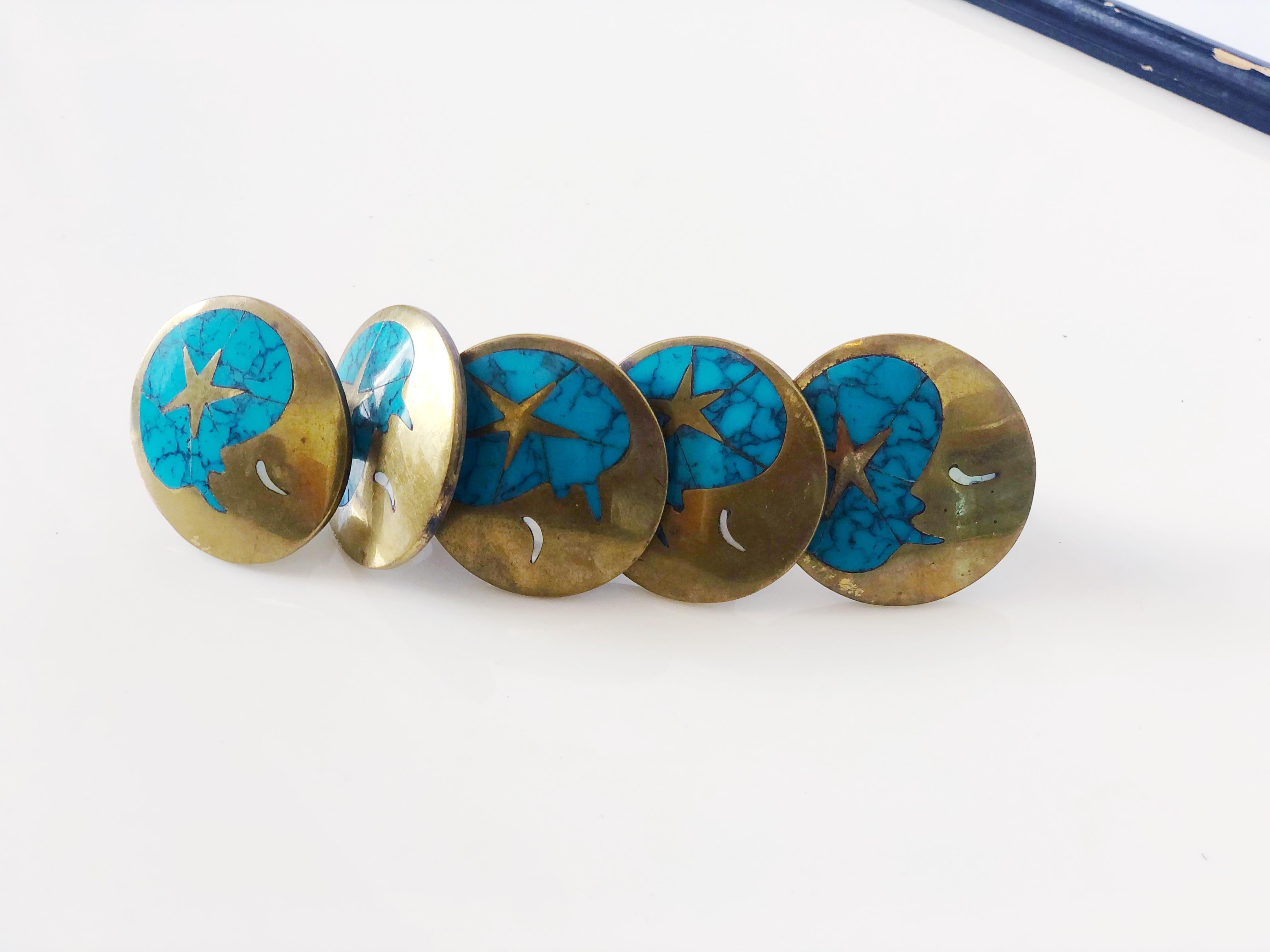 These vintage blue turquoise and brass drawer pulls by Los Castillos are in overall great condition. Mystical star and moon motif.
Taxco, Mexico. circa 1960s.
Items sold separately.
Dimensions:
1.5