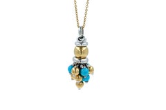 Blue Turquoise Diamonds Golden Sphere Bells Motif Two Tone Gold Pendant Necklace