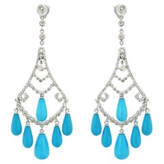 Orecchini Chandelier con diamante blu e diamante bianco in oro bianco 18 carati
