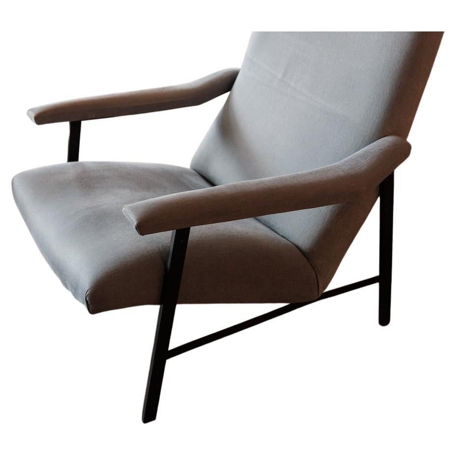 Blue Upholstered Armchair with Black Metal Frame from Lucca Antiques. There is slight wear on right armrest.

Andy Cohen is a longtime supporter of Housing Works and has generously donated this exclusive item from his personal home collection, to be