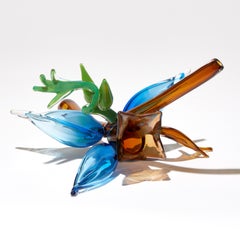 Blue Uprising, a floral & botanical glass sculpture by Michèle Oberdieck