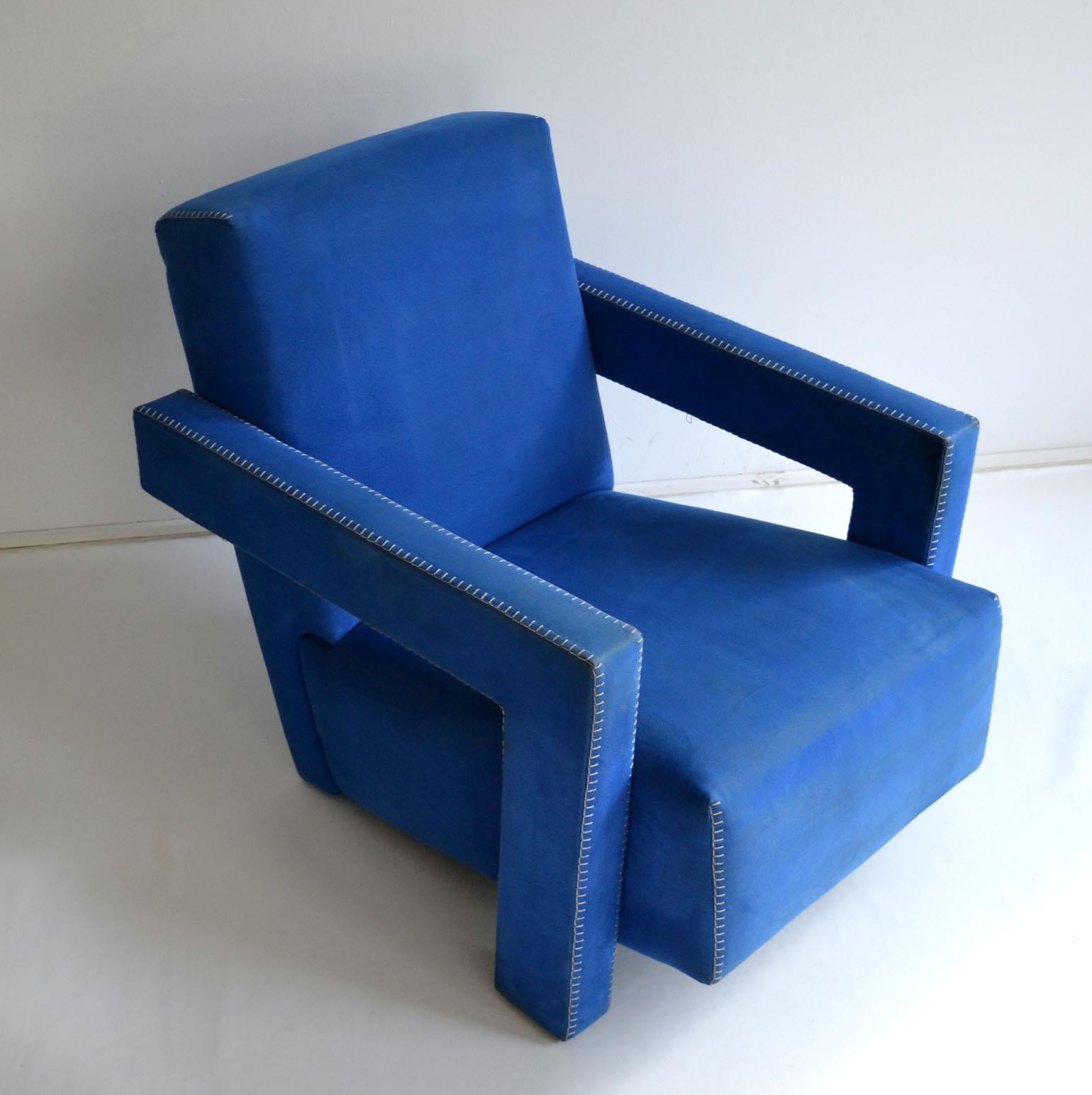 Vintage Gerrit Rietveld 'Utrecht 637' chair designed in 1935 and made by Cassina since the late 1980s. This chair retains the original blue alcantara fabric with ivory blanket stitch trim with original label and signature.
The Utrecht chair is one