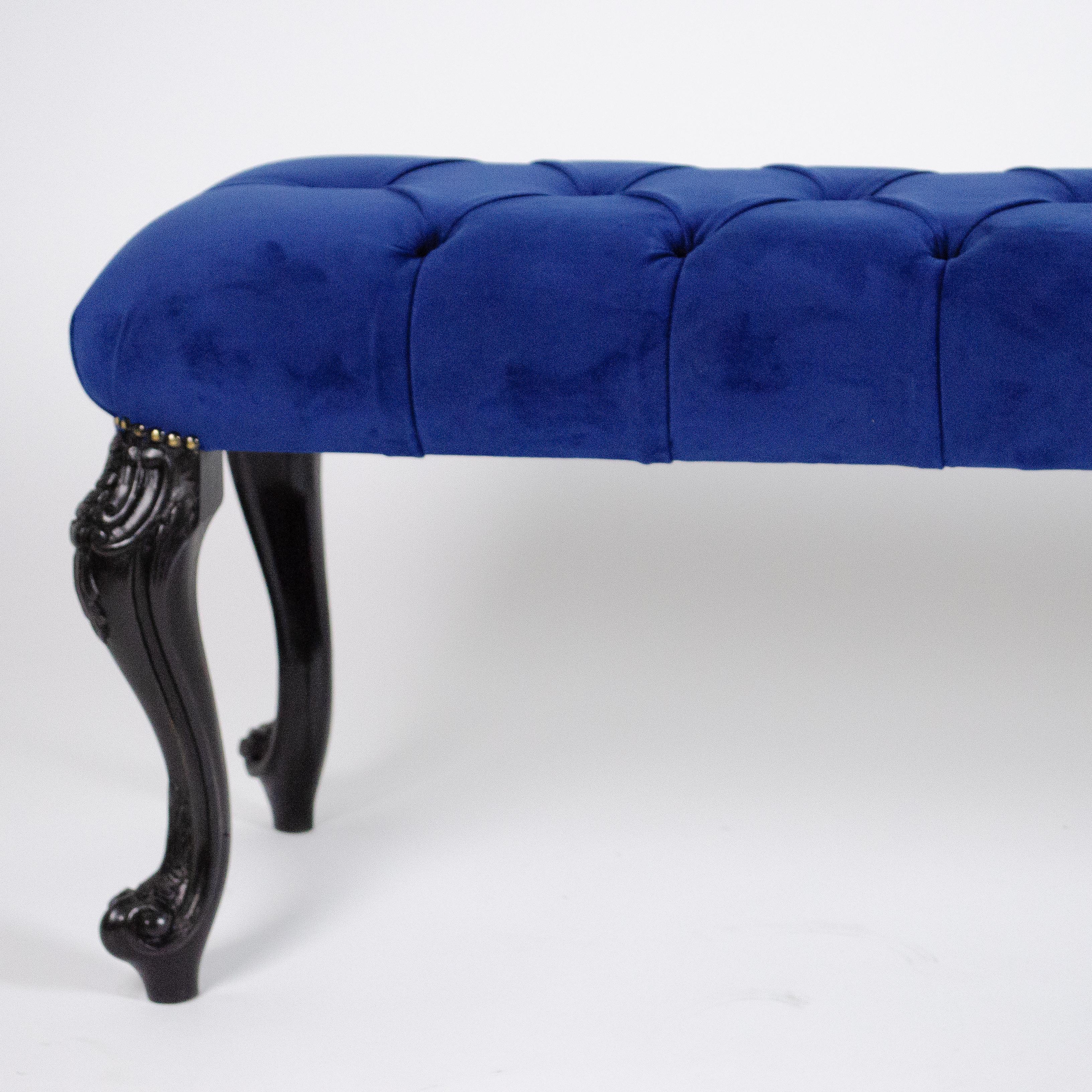 Blue electric velvet reupholstered bench with black ebonized and engraved legs. 
Size: L 140 cm, D 45 cm, H 49 cm
How to set in a room: this kind of bench is perfect at the end of a bed, along a corridor, in an entrance, to complete seats in a