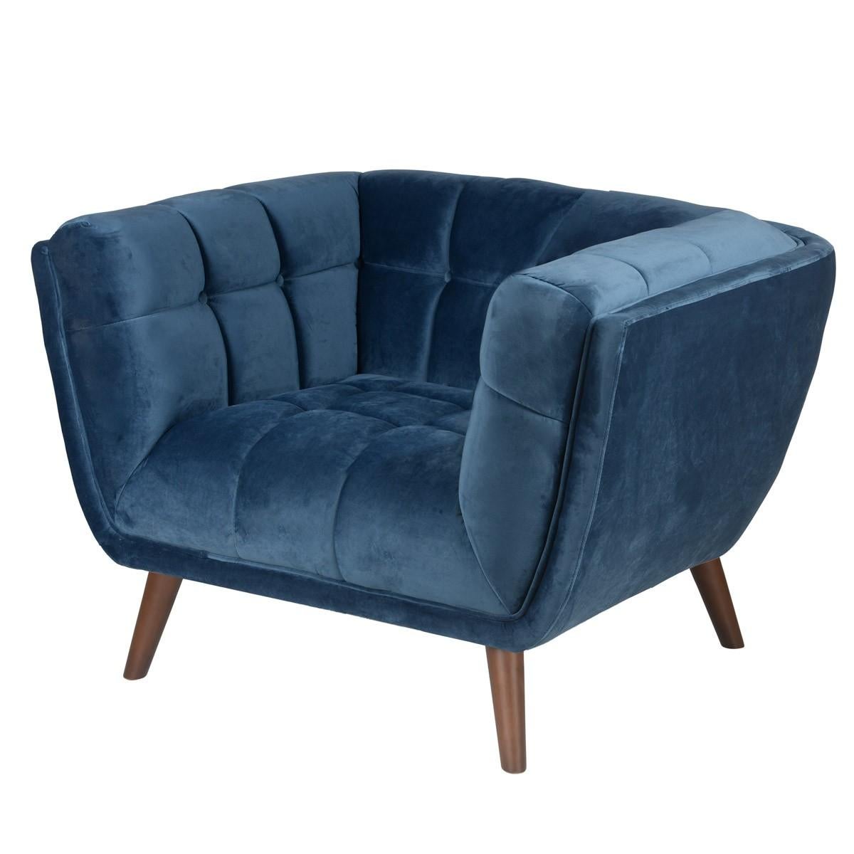 Comfy and elegant armchair dressed in trendy dark blue velvet and walnut legs 