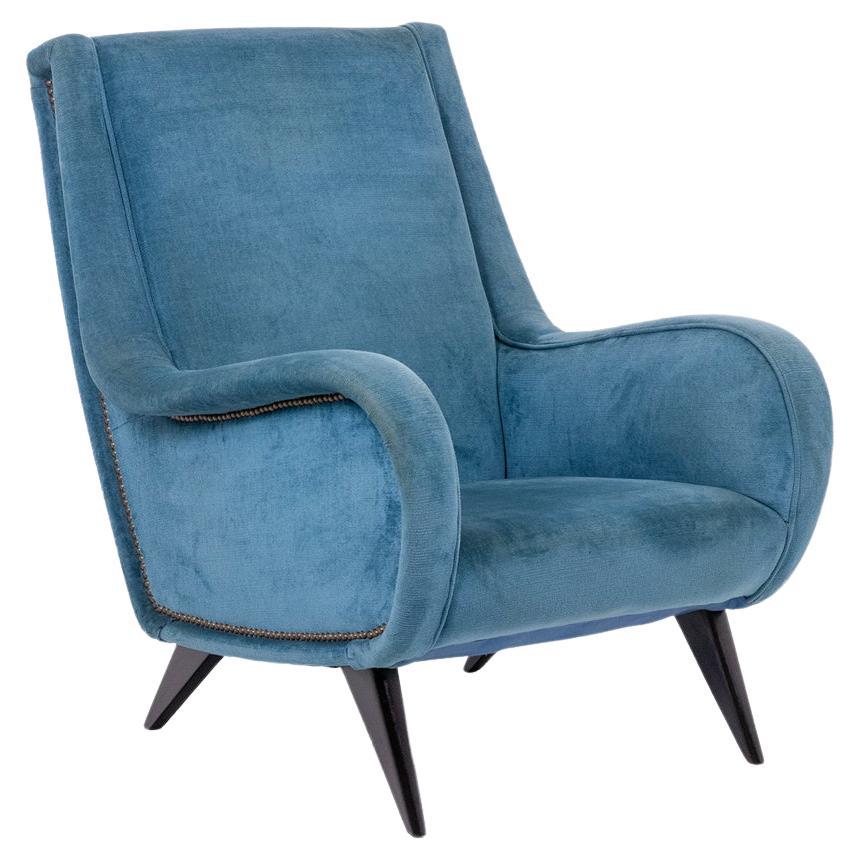 Blue velvet armchair, beech base. 1950s.