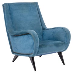 Blue velvet armchair, beech base. 1950s.