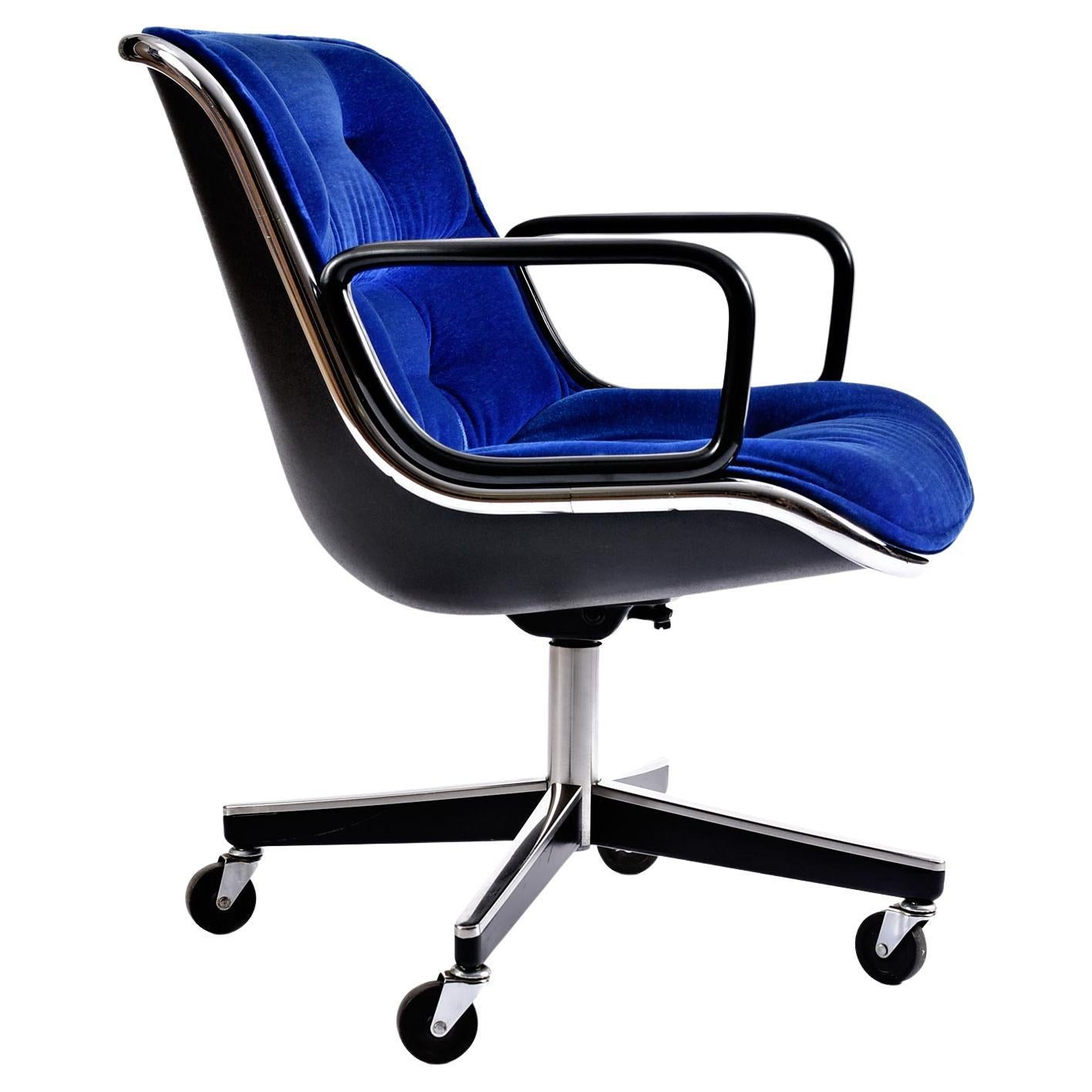 I don't think there could be a cooler color / fabric combination Pollock chair in existence. The blue velour looks both original and in exceptional condition. The chrome edge band seals the deal. This chair vibrates with uber-swank mojo. It is truly