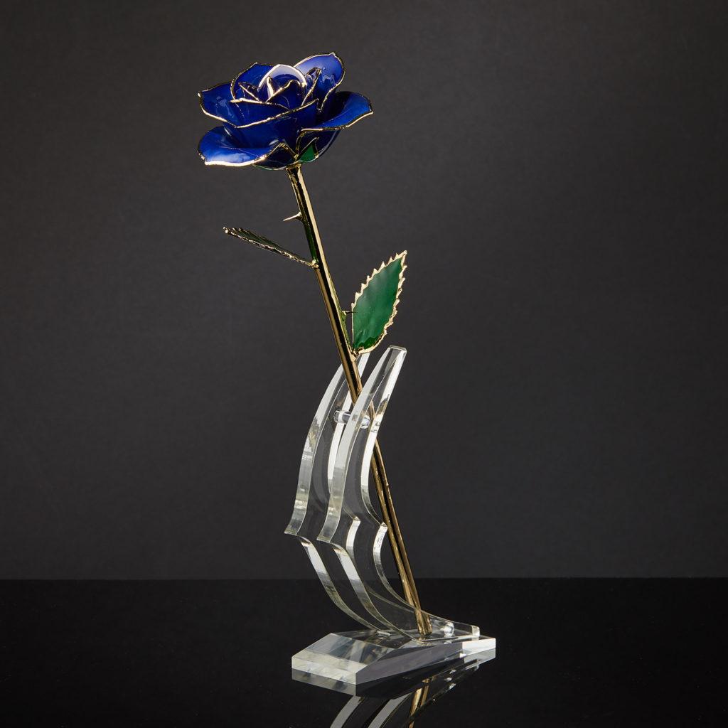 Meaning Behind The Rose. Like the song with the same name, our Blue Velvet Eternal Rose is reminiscent of simpler times and memories of love and innocence. The deep blue hue is like an ocean as deep as your love. Perfect for graduations, birthdays