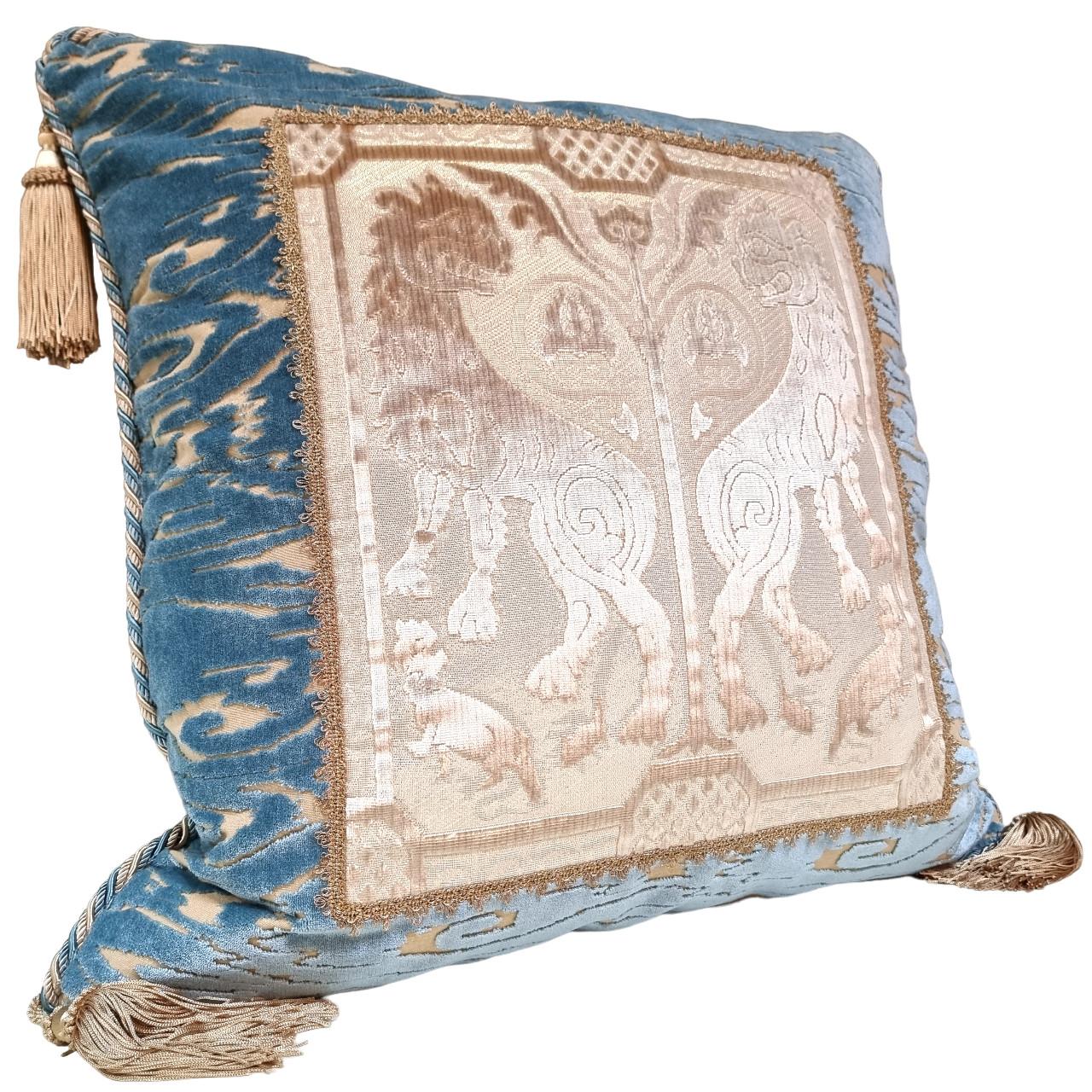 This amazing decorative pillow with beige tassel at the four corners is handmade using sky blue Luigi Bevilacqua velvet Radica pattern on both sides finished with Houlès multicolor twisted lip cord, embellished with front positioned panel in Luigi