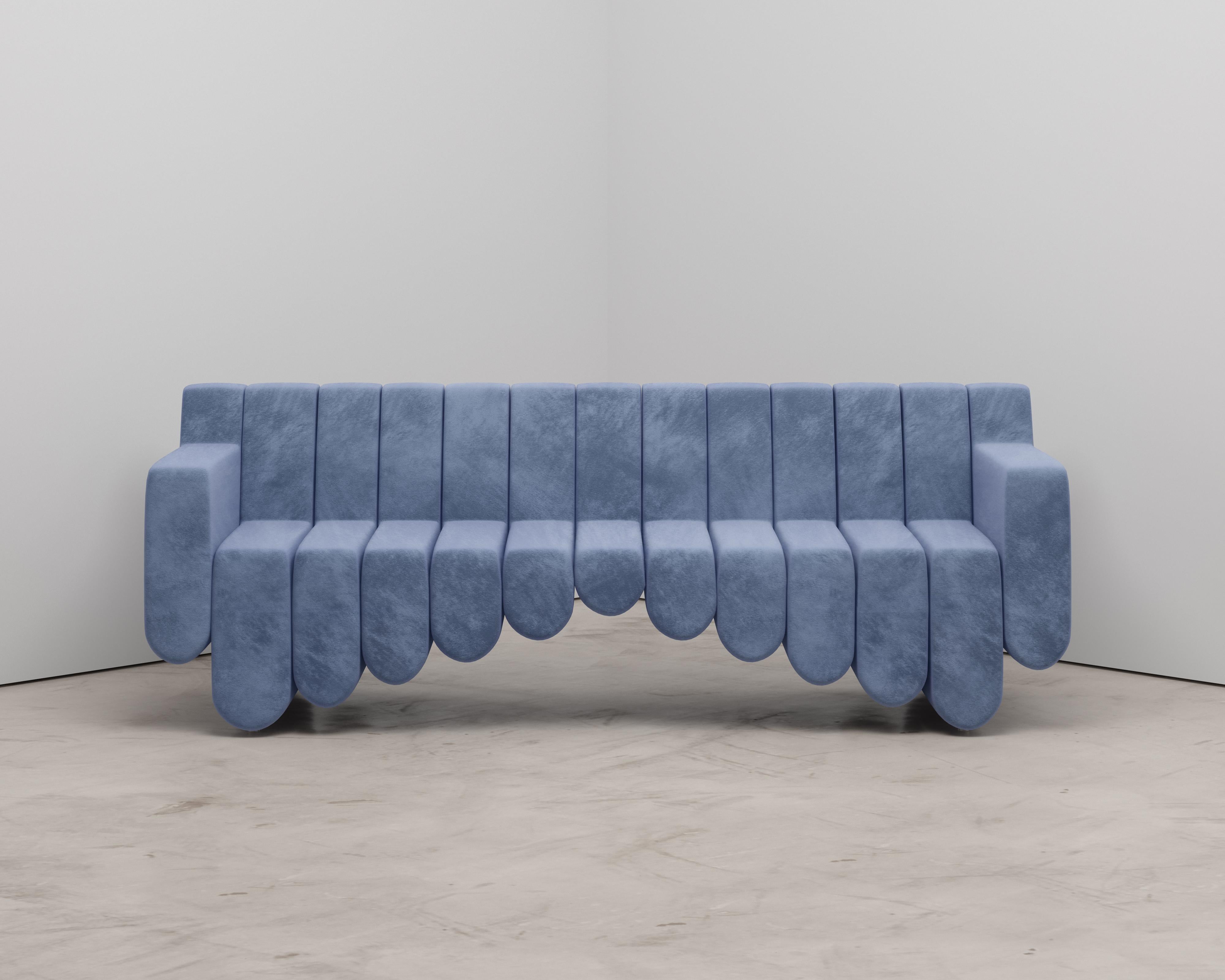 The Sound Sofa gets its name and inspiration from the shape and movement of sound waves. Very plush and comfortable with plenty of room for 3 people. Or just you to take an afternoon nap. 

Troy Smith is a Canadian artist, designer, sculptor and