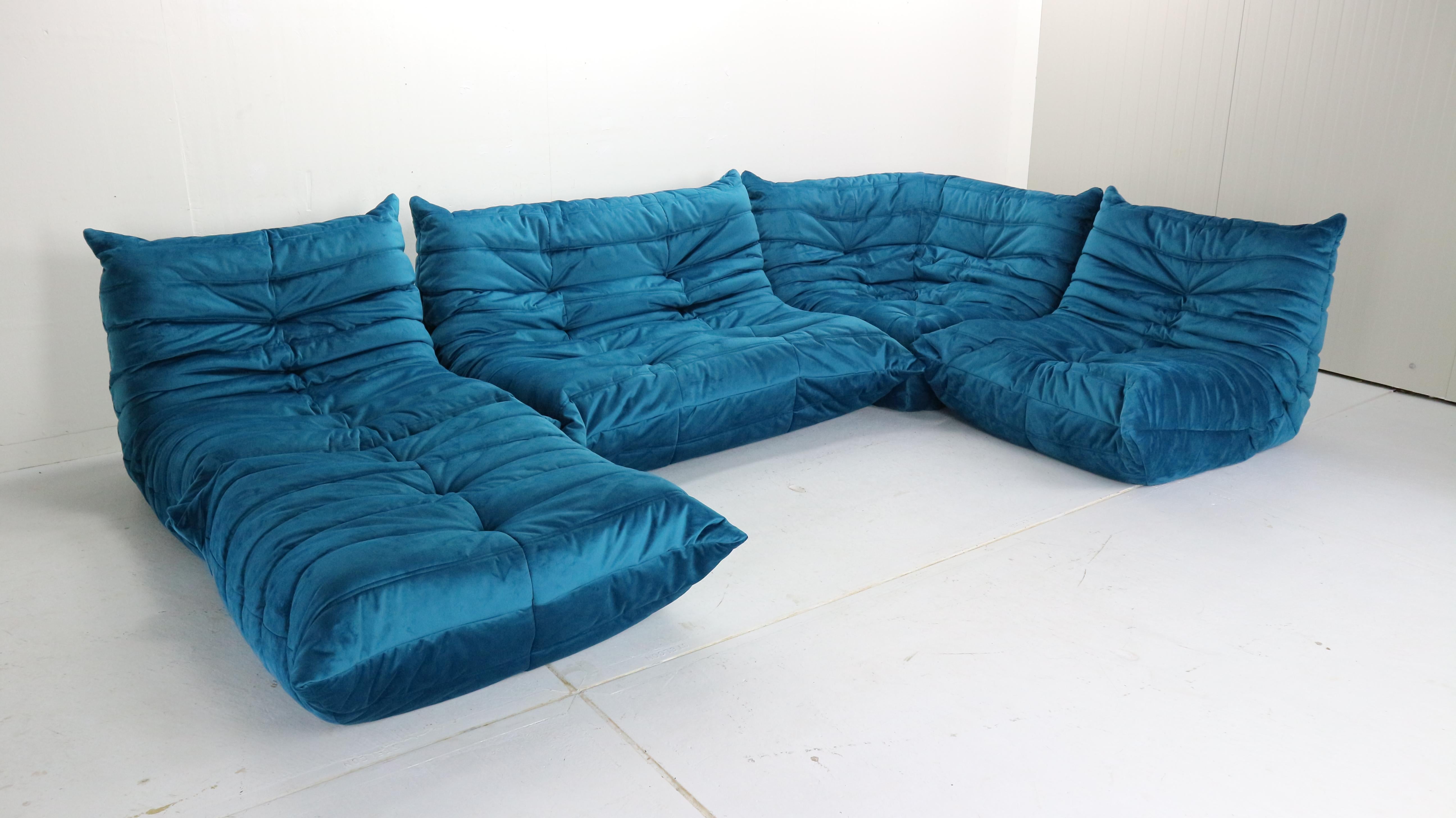 Magnificent Togo living room set was designed by Michel Ducaroy in 1973 and was manufactured by Ligne Roset in France.
Very comfortable and beautiful accent to your living room space.
It has been reupholstered in a blue soft velvet fabric.
The