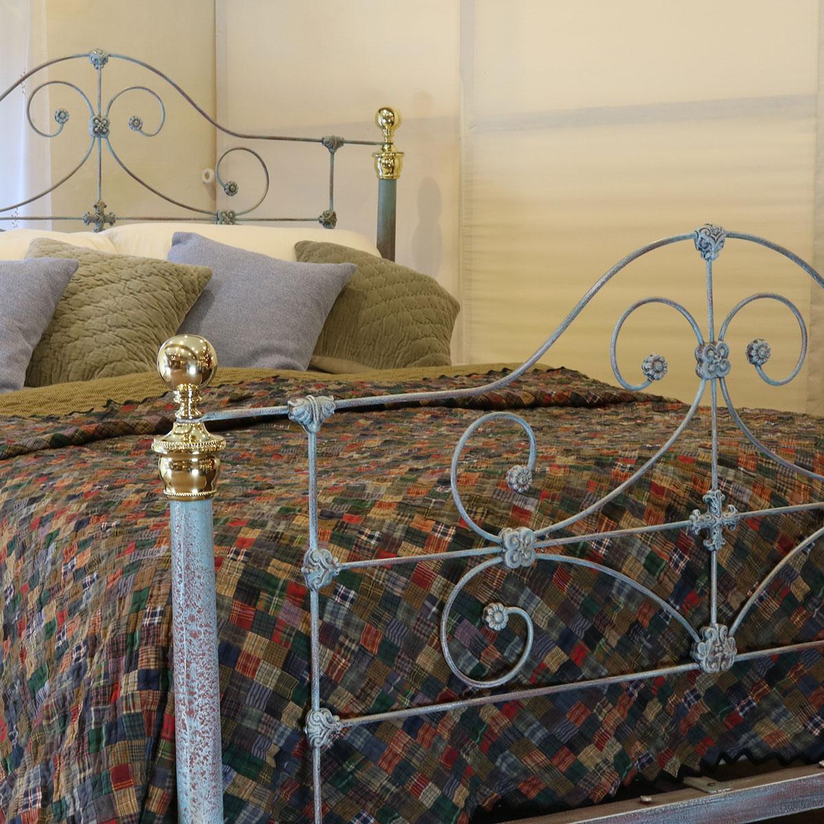 Antique bed in blue Verdigris with scroll design, tapered posts and decorative brass. 

This bed accepts a UK King size or US Queen size (5 ft., 60 in or 150 cm wide) base and mattress set.

The price includes a standard firm bed base to support the
