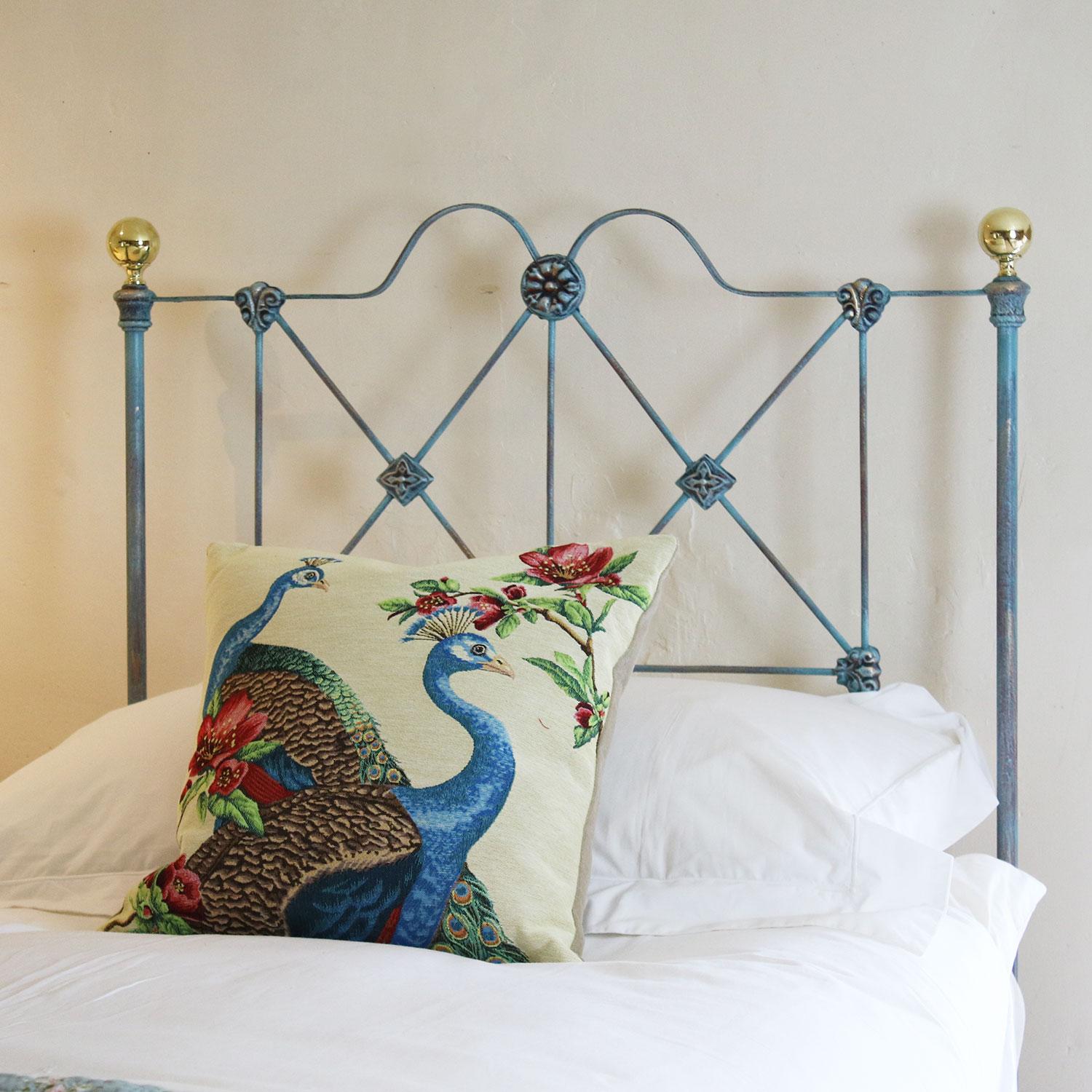 Matching pair of low end/platform bedsteads, finished in blue Verdigris - adapted from an original mid Victorian bedstead.

The price includes a pair standard single firm bed bases to support the mattresses. 

The mattresses, bedding and bed linen