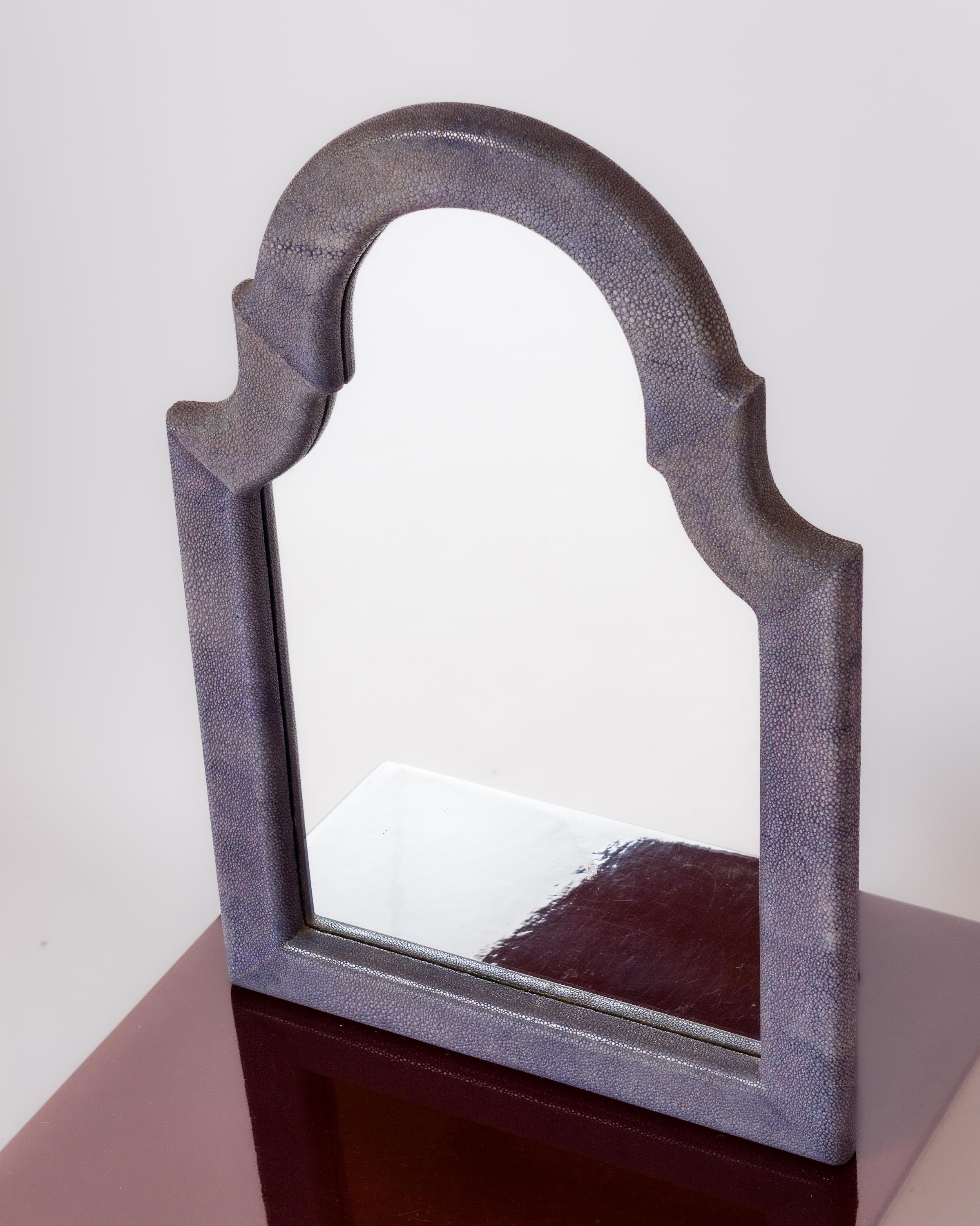 Shagreen table mirror with a folding foot at the back allowing it to be placed on a desk or dressing table. Pediment called 
