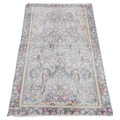 Tapis persan vintage bleu à motif de feuilles de Kerman et d'oiseaux noués à la main 1'9"x3'7"