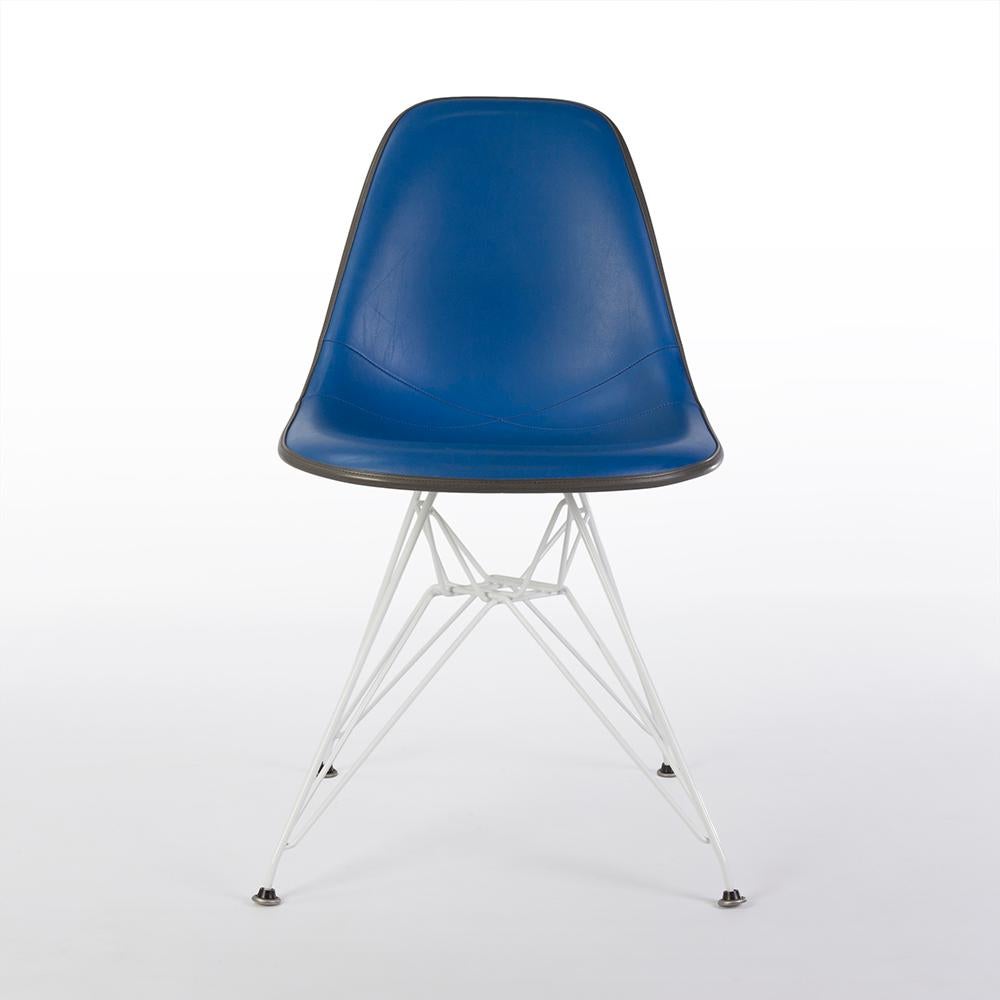 An original Herman Miller blue vinyl upholstered Eames side chair with white shell is not for the faint hearted especially on a new, used, white Eiffel DSR base! This eye-catching chair is in excellent condition. The vinyl is in good condition with