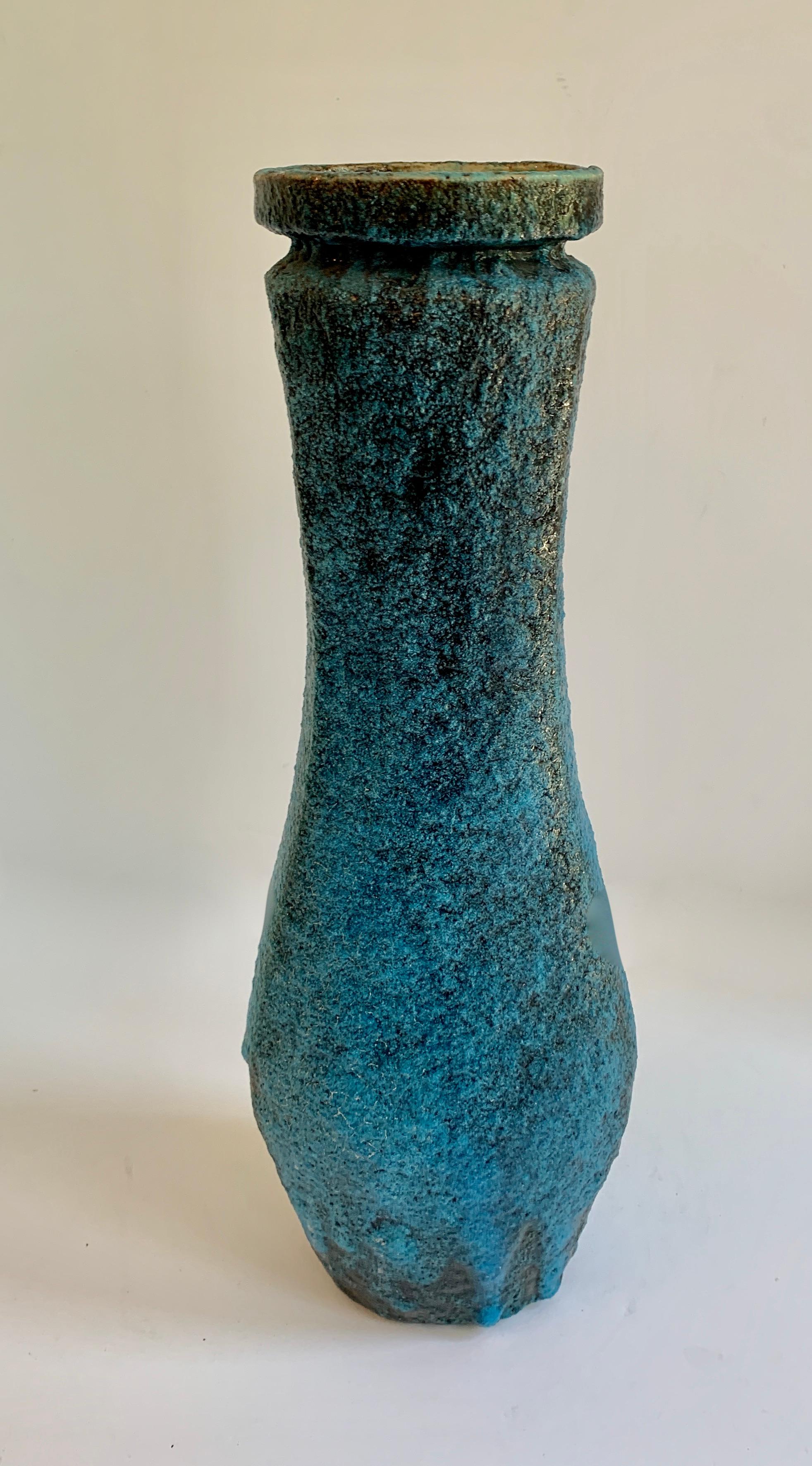 Midcentury vase in Blue volcanic glaze, a unique blend of both blue to black nuances of color. A large and beautifully shaped piece makes a statement as a standalone piece or practical as a vessel.