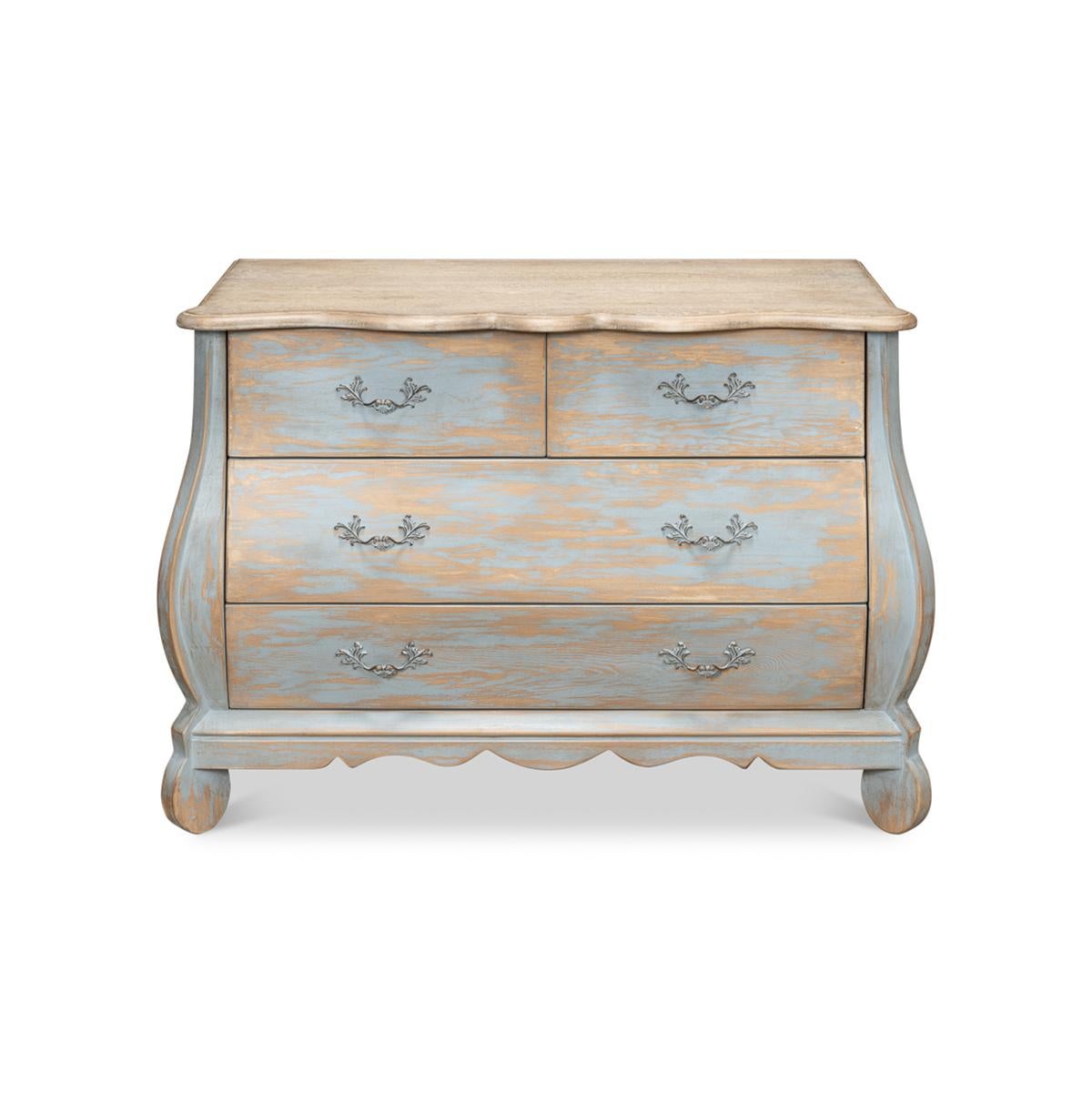 With two short drawers above two long drawers, made with reclaimed pine with an antiqued and distressed washed blue painted finish. The scalloped and shaped top of oak in a natural finish. 

Dimensions: 44