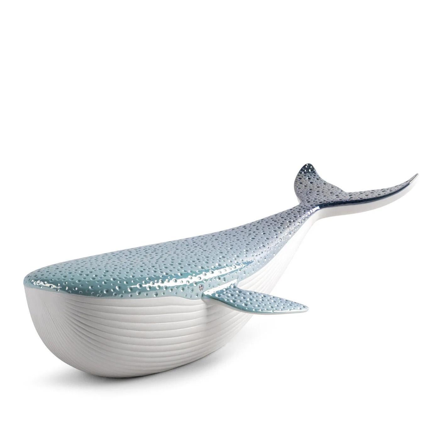 Sculpture Blue Whale with all structure in porcelain 
in matte finish and in glazed metallic lustrous finish.