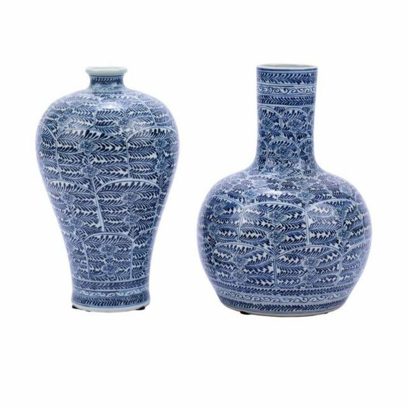 Blue & white blossom globular porcelain vase

The special antique process makes it looks like a piece of art from a museum. 
High fire porcelain, 100% hand shaped, hand painted. Distress, chips and other imperfections create great characters of