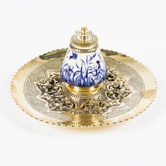 Blue & white ceramic inkwell with circular brass stand