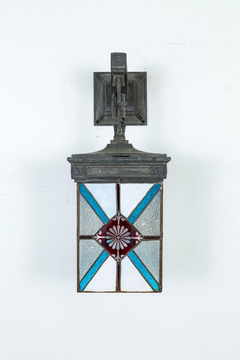 Art Deco Blue, White and Deep Red Stained Glass and Bronze Lantern Sconce
