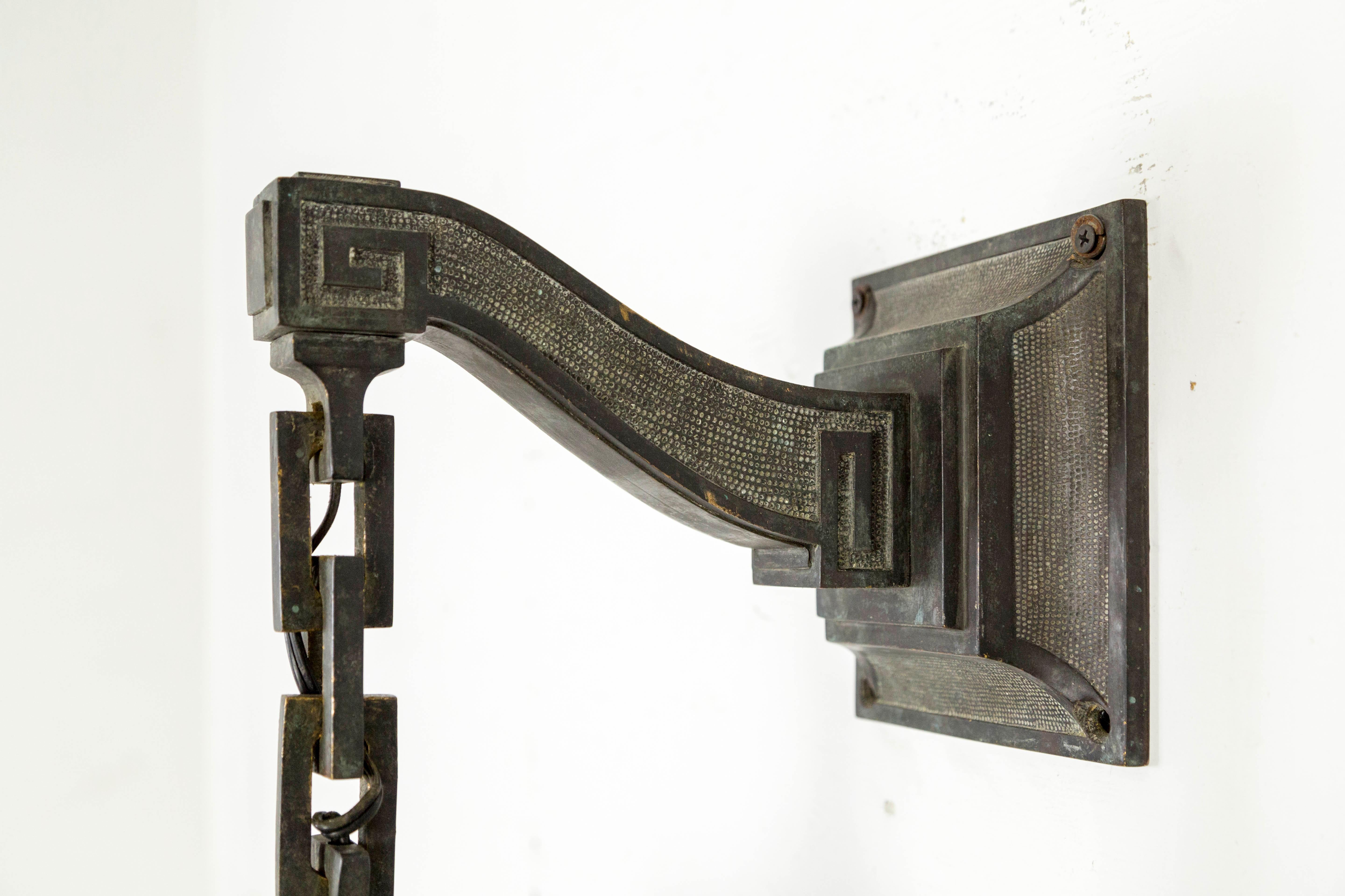 Early 20th Century Blue, White and Deep Red Stained Glass and Bronze Lantern Sconce