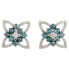 Boucles d'oreilles florales en or blanc 18k diamants bleus et blancs